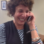 Rebecca Gibson, a lecturer at Tufts University and a member of the organizing committee, spreads news of the victory after the NLRB count.